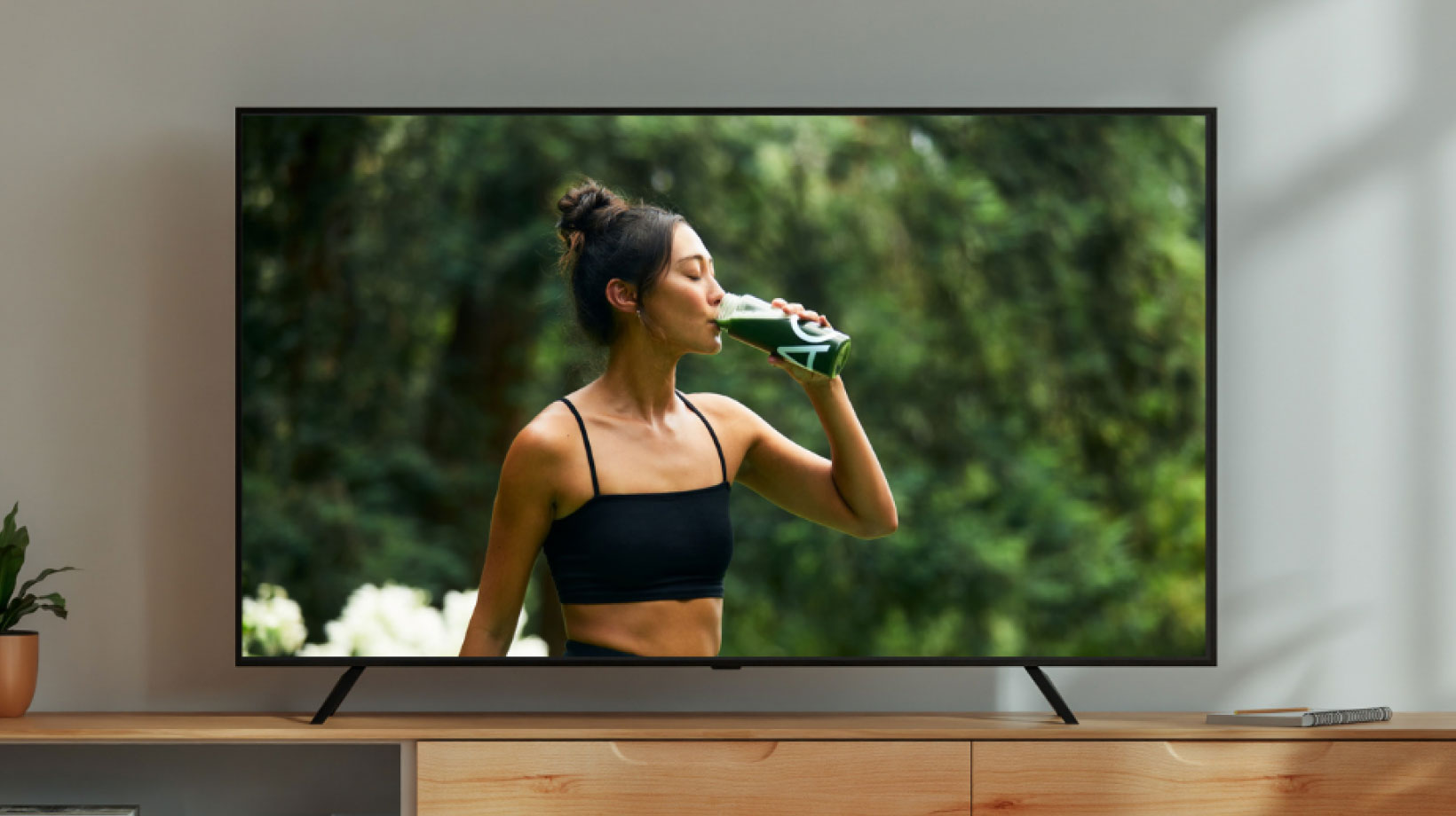 TV showing an Athetic Greens commercial